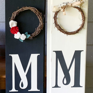 Home sign with wreath or windmill